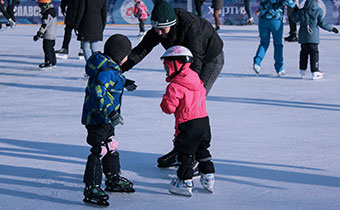 family outdoor ice skating